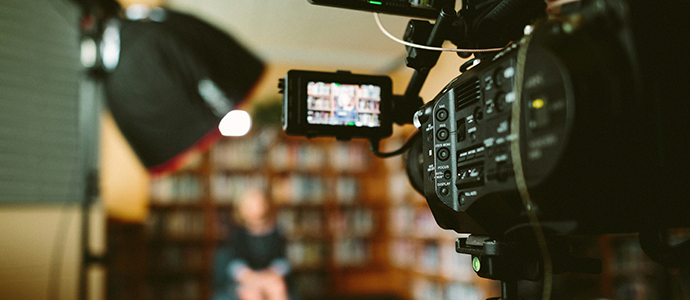 professional camera filming an interview